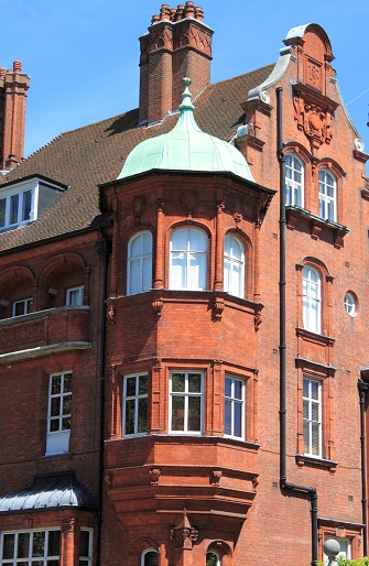 Detailed view of a balcony in a typical british red brick mansion