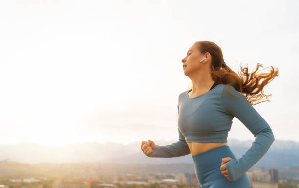 istock Athletic woman is running 1436090338