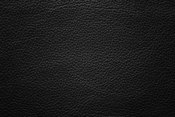 istock black leather texture, skin surface as dark background 1436092326