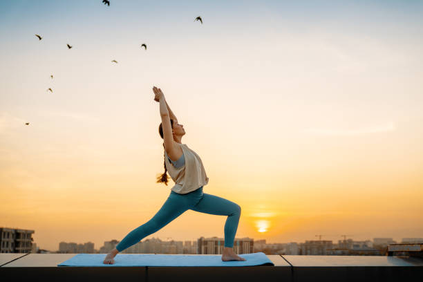 sportswoman is doing yoga
