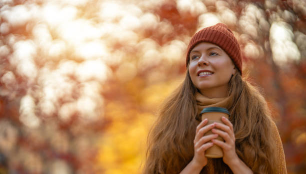 istock Woman is walking in the park. 1436092540