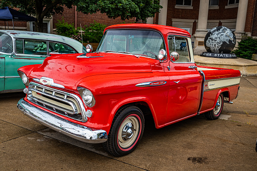 Des Moines, IA - July 01, 2022: High perspective front corner view of a 1957 Chevrolet 3124 Cameo Carrier Pickup Truck at a local car show.