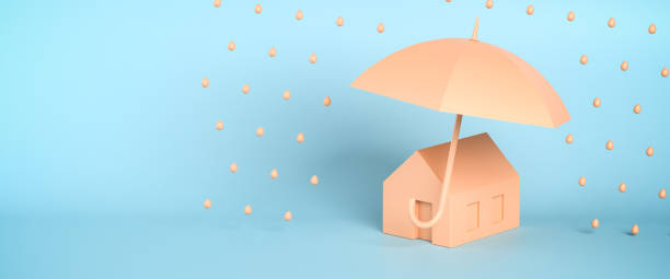 istock Protection or insurance concept: A minimalistic house under an open umbrella protecting it against rain. Web banner format 1436093973