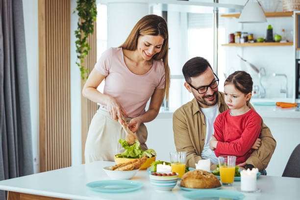 istock Happy family in the kitchen 1436096155