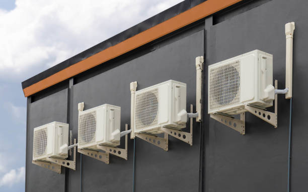 istock Air conditioner compressor outside the modern building, Exterior air conditioning unit 1436098007
