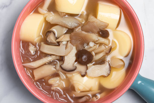 istock Mushroom soup with tofu, healthy concept. 1436098124