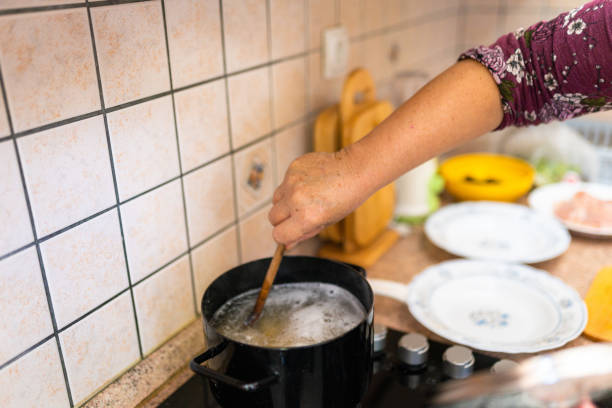 istock Senior woman doing daily chores 1436100686
