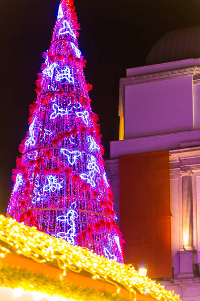istock christmas tree decoration in a modern city center at night 1436101388