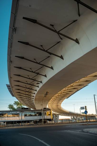 istock Vertical shot of a train under the bridge in Alges, Lisbon 1436105675