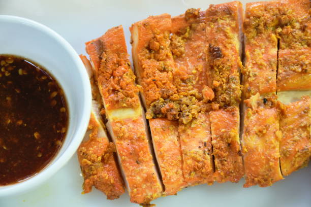 istock grilled slice chicken breast dipping with spicy sauce 1436108767