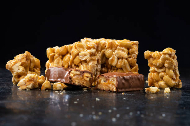 istock Sweet chocolate bar caramel with nuts and peanuts 1436115164
