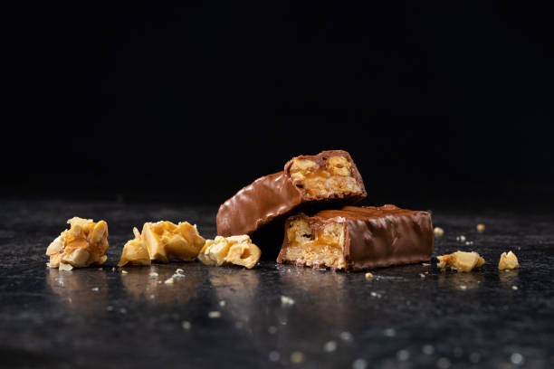 istock Sweet chocolate bar caramel with nuts and peanuts 1436115183