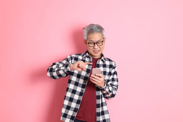 istock Asian Man on Pink 1436115386