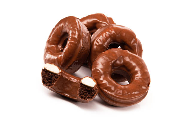 istock Tasty glaze chocolate donuts isolated 1436117682