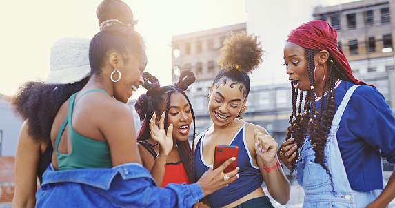 Phone, city fashion and black women bonding with social media, dating app profile or internet gossip. Smile, happy and cool friends or students with 5g mobile technology and cool clothes in New York