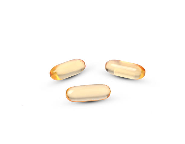 istock Primrose oil capsules isolated on white background. 1436120900