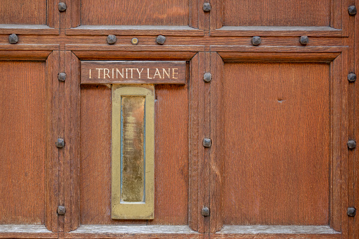 College door in Cambridge, Cambridgeshire, England, UK.   This is the entrance to the Masters Lodge for Trinity College.
