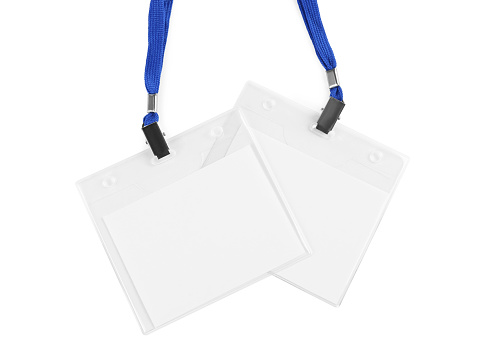Closeup of a file folder with a stamp reading 'confidential' on a white background.