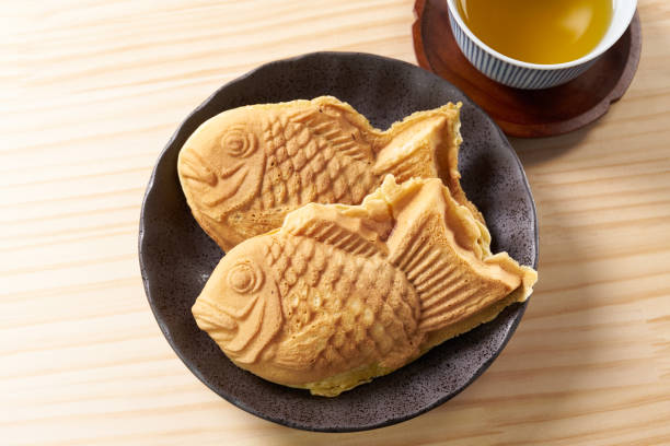 istock Japanese taiyaki, fish-shaped cake with sweet red bean paste 1436122808
