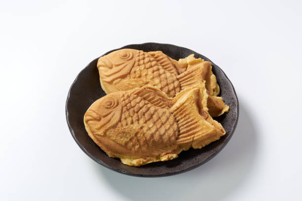 istock Japanese taiyaki, fish-shaped cake with sweet red bean paste 1436122834