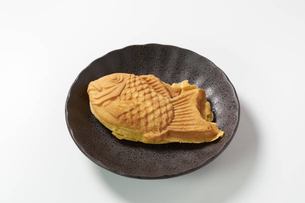 istock Japanese taiyaki, fish-shaped cake with sweet red bean paste 1436122932