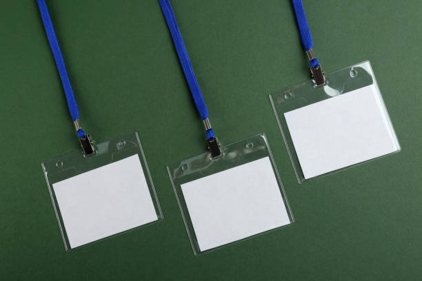 istock Blank badges on dark green background, flat lay. Mockup for design 1436123571