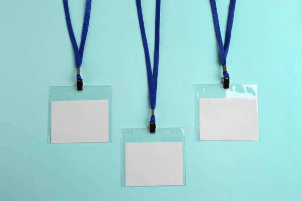 istock Blank badges on turquoise background, flat lay. Mockup for design 1436124041