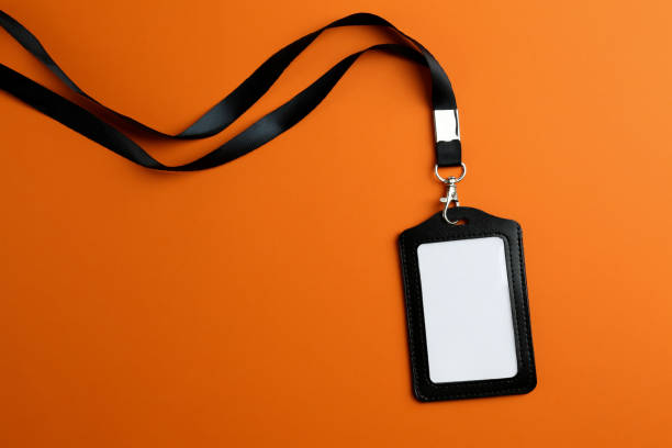 istock Blank badge on orange background, top view. Mockup for design 1436124845