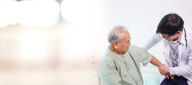 istock Doctor examining an elder male patient. 1436124921