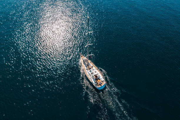 istock Drone View Sail Boat in Cruising at Sea 1436128227