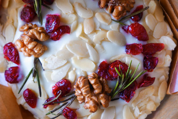 Easter composition. Decorated Easter sweet cake with candied fruits and nuts. Close-up photo.