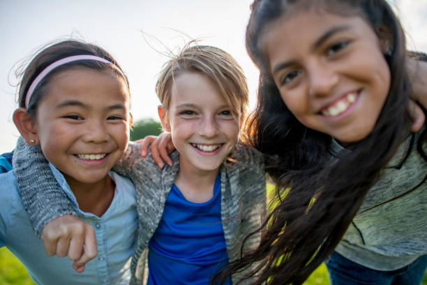 istock Elementary Friends Outdoors 1436137158
