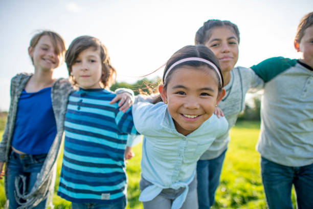 istock Elementary Friends Outdoors 1436137179