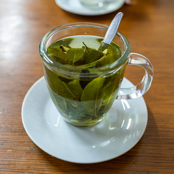 istock coca tea in a glass cup on a wooden table 1436137314