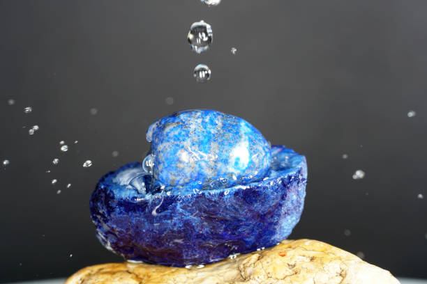 istock Quartz with mineral crystals against a black background 1436137380