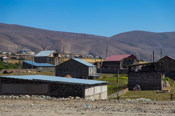 istock Small village with a mountain and blue sky background 1436138002
