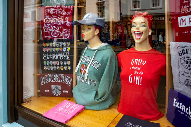 A laughing mannequin head with exaggerated features, red headband with blue floral pattern, and red painted lips. Perfect for creative projects and joyful advertisements.