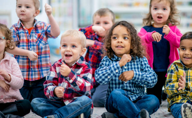 istock Preschool Children Singing During Circle Time 1436145326