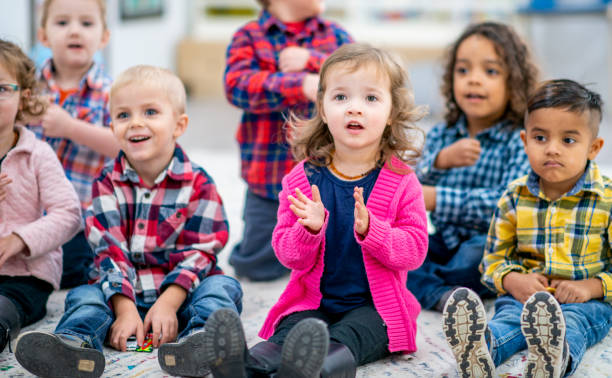 istock Preschool Children Singing During Circle Time 1436145333