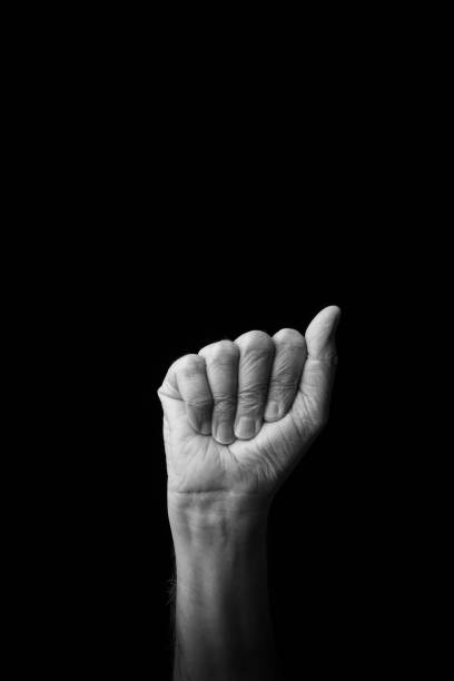 istock Hand demonstrating the Japanese sign language letter 'A' or '.' with copy space 1436147281