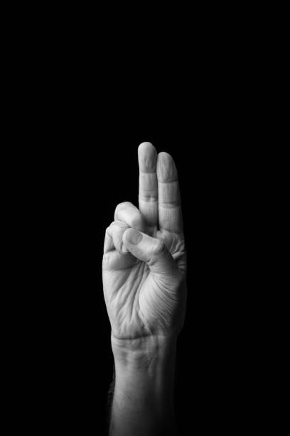 istock Hand demonstrating the Japanese sign language letter 'U' or '' with copy space 1436147283