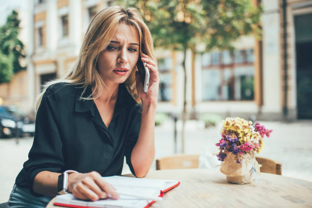 istock Unhappy woman received operator call from customer service puzzled on information about roaming tariff, disappointed female discussing connection problems during international communication 1436149488