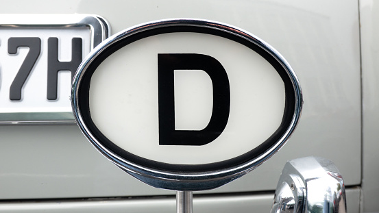 Oval license plate D to identify a German vintage vehicle