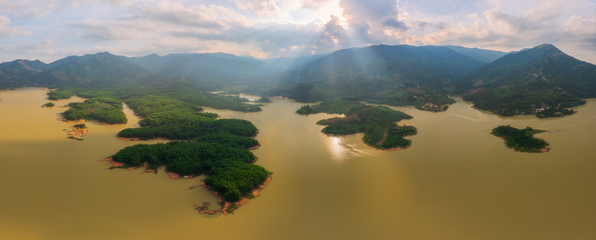Drone view sunset on Suoi Dau lake - a water reserve lake of Suoi Cat, Cam Lam town, Khanh Hoa province, central Vietnam