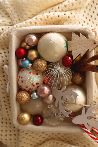 istock Basket of Christmas Decorations and Blanket 1436157049