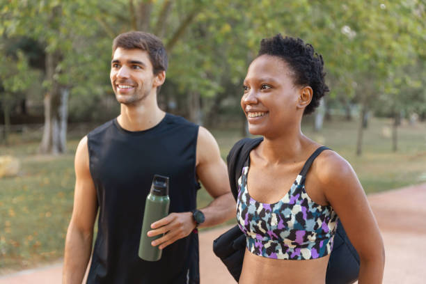 istock Sportive couple in morning park 1436158225