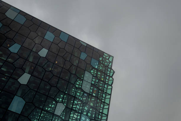 Reykjavik, Iceland - August 10, 2022: Exterior shot of the Harpa Concert Hall and Conference Centre, home of the Icelandic Opera since 2011, in Reyjkavik