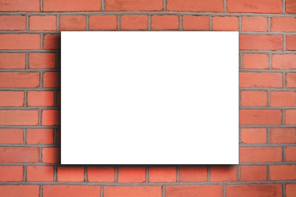 istock Square white blank signage hanging in red brick wall 1436161147