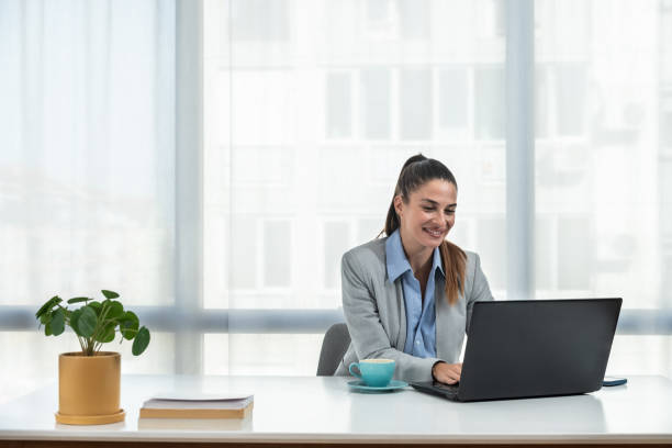 Young woman health care worker psychologist and psychotherapist talking online on web conference video call about how to reduce stress and anxiety in everyday life. Female expert telemedicine. stock photo