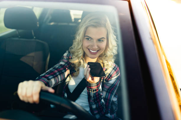 istock Young woman in car 1436163054